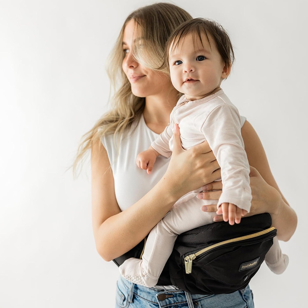 Tushbaby Original Hip Seat Baby Carrier for Babies & Toddlers up to 45 lbs, Safety Certified, Lightweight No-Foam Design with Storage & Nursing Support, Black & Gold